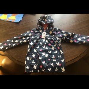 Girls butterfly color changing raincoat 8Y